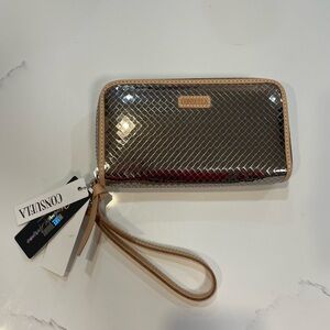 Consuela Shimmering Silver Wristlet with Tan Trim